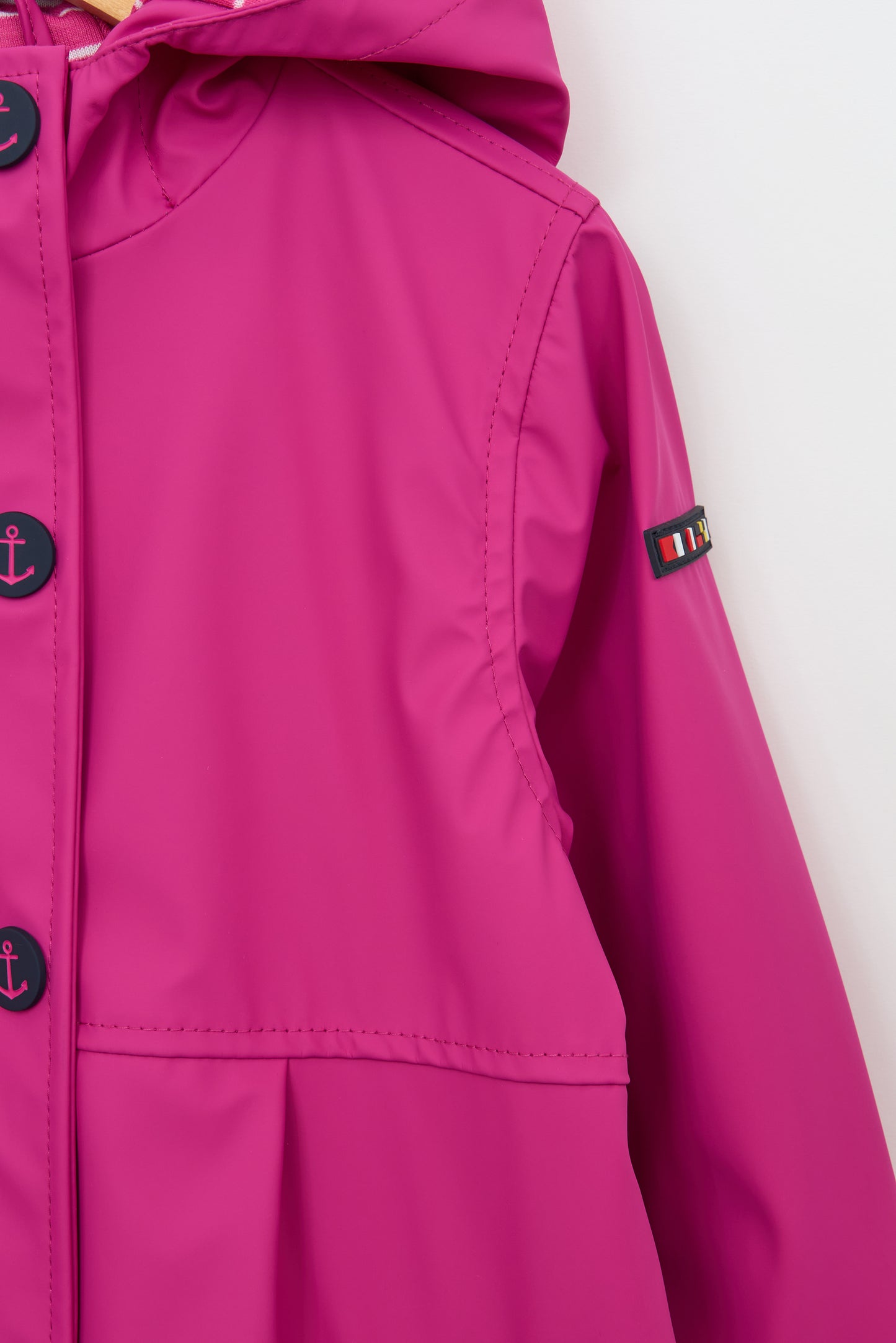 Chubasquero botones ancla niña