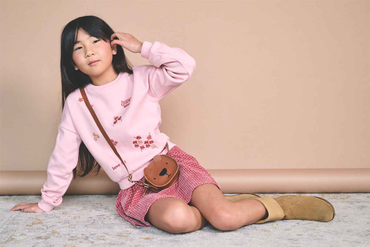 Jersey suave de pelo con bordado Konono niña