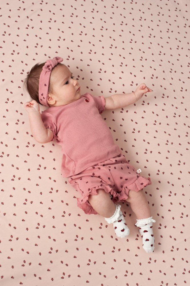 Pantalón corto de canalé bebé niña Lovebug